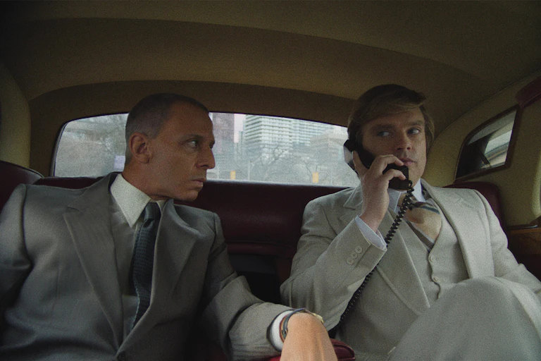 Donald Trump and Roy Cohn in a car.