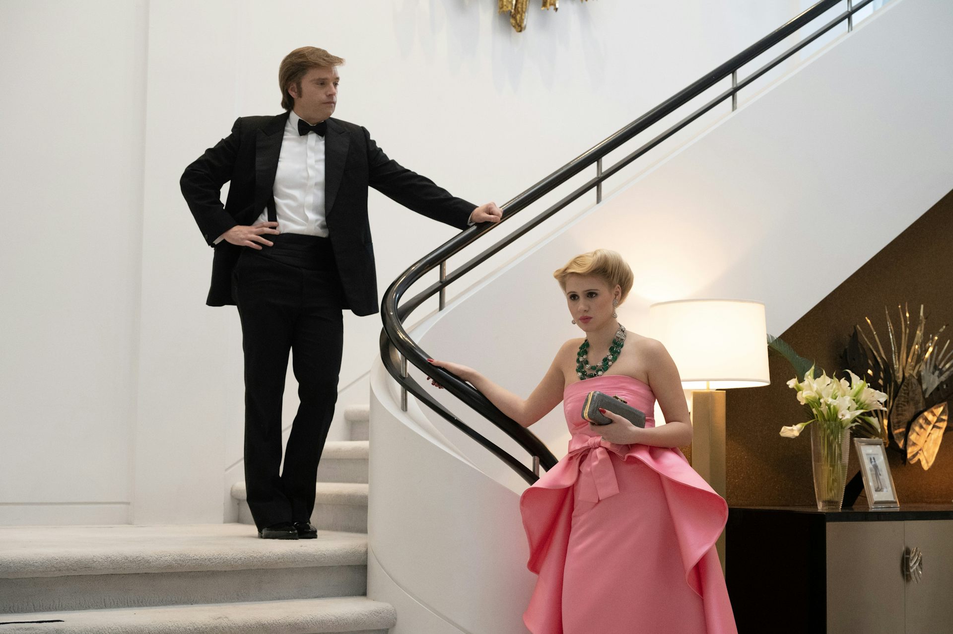 Donald and Ivanka Trump on a white staircase.