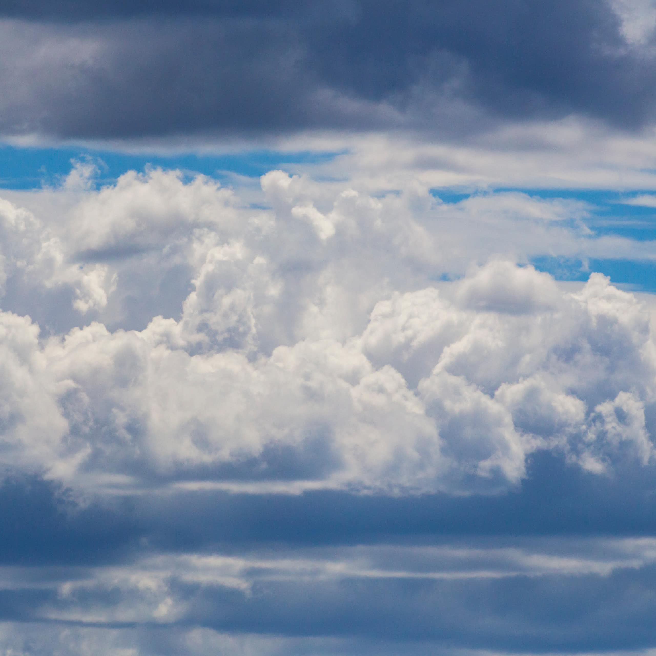 Vief of the sky filled with towering puffy clouds