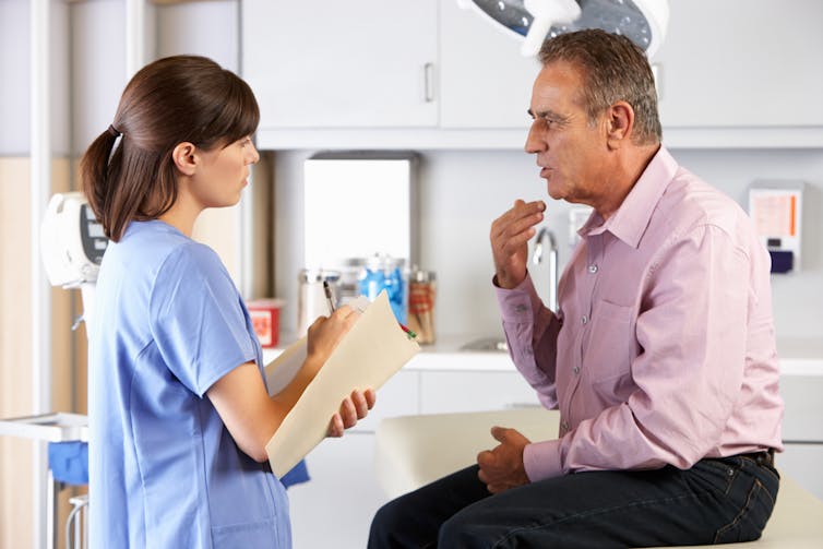 Doctor talks to patient