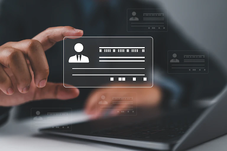 Hand holding a digital licence.