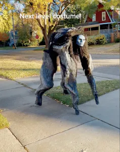 A weird four-legged creature that is half human half animal for Halloween.