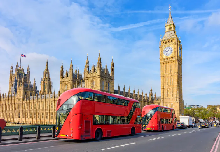 London buses near the Houses of Parliament.