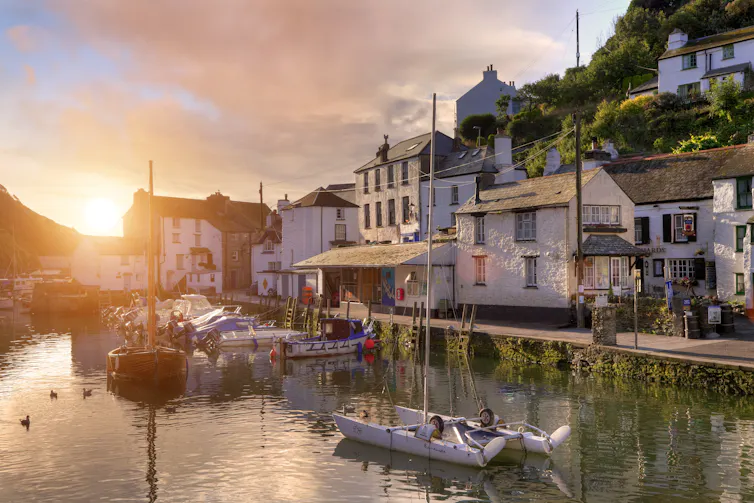 Houses overlooking small harbour.
