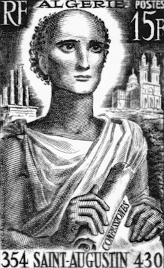 A black and white illustration of a man with short, curly hair, wearing a toga.