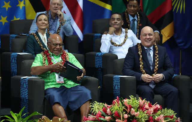 Sitiveni Rabuka, Prime Minister of Fiji (left) and New Zealand Prime Minister Christopher Luxon (right) attending the Chommonwealth leaders meeting in Samoa.
