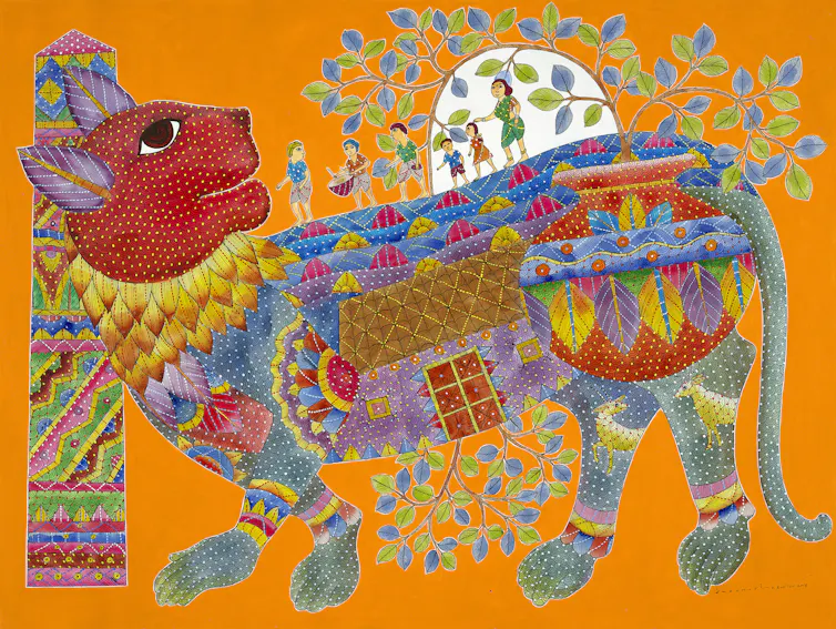 Un colorato dipinto indiano raffigurante un gatto.