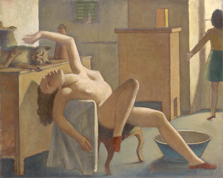 A naked woman lazily pats a cat.