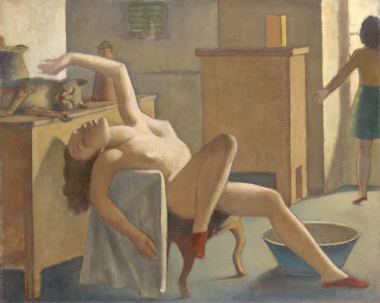 A naked woman lazily pats a cat.
