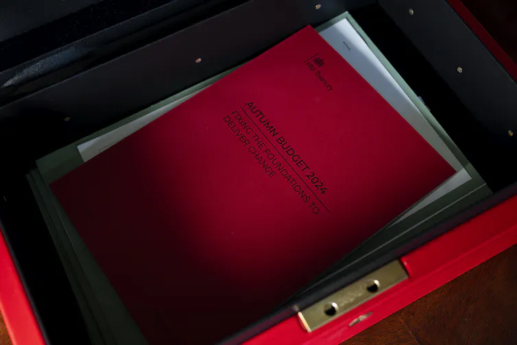 A copy of the Budget inside a red ministerial box.