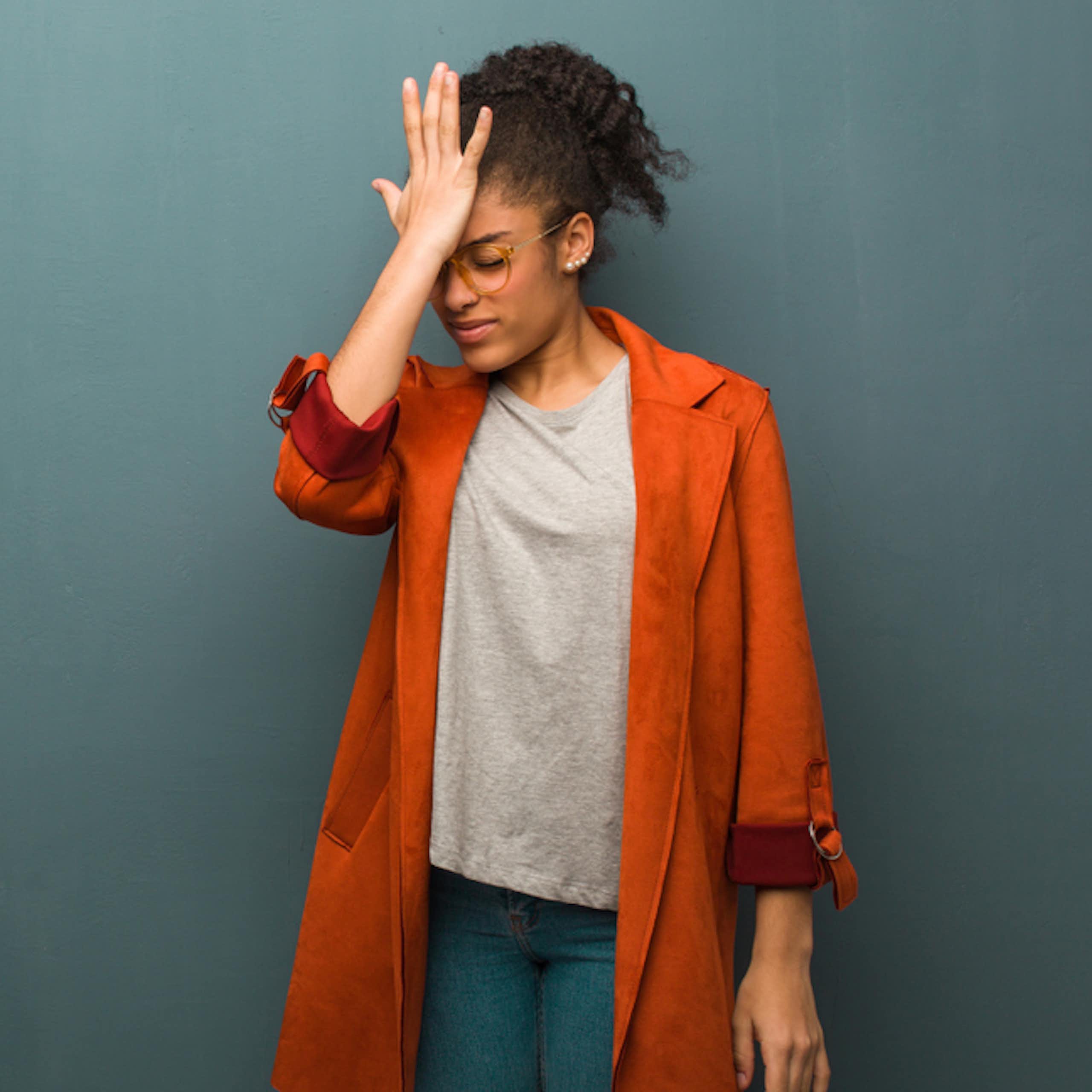 Woman slapping her head