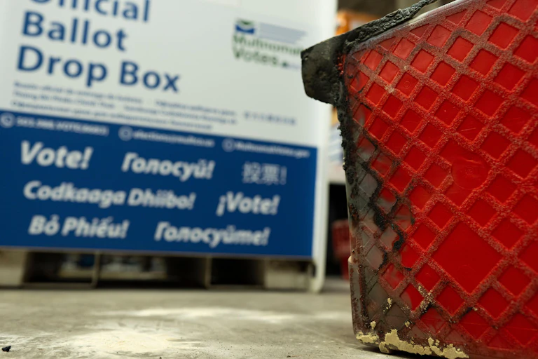 A damaged ballot box and bins that were damaged by an arson attack in Oregon.