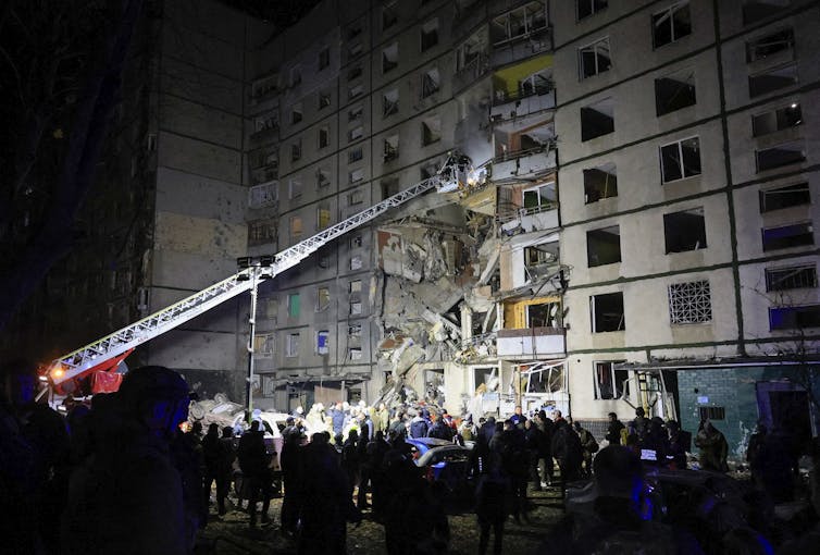 A residential building in Ukraine struck by a Russian bomb.
