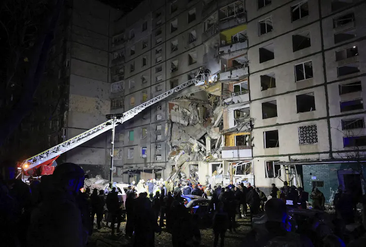 A residential building in Ukraine struck by a Russian bomb.