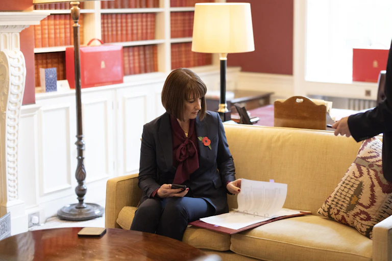 Chancellor Rachel Reeves looking over her budget before addressing the Commons