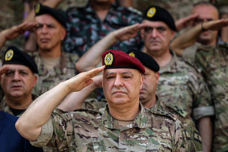 General Joseph Aoun (C), commander of the Lebanese armed forces, salutes