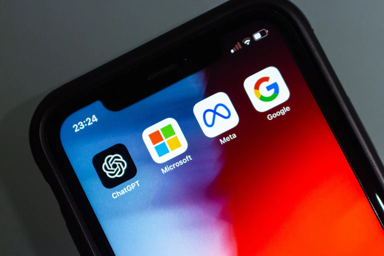 The upper third of a smartphone screen with app icons for ChatGPT, Microsoft, Meta and Google