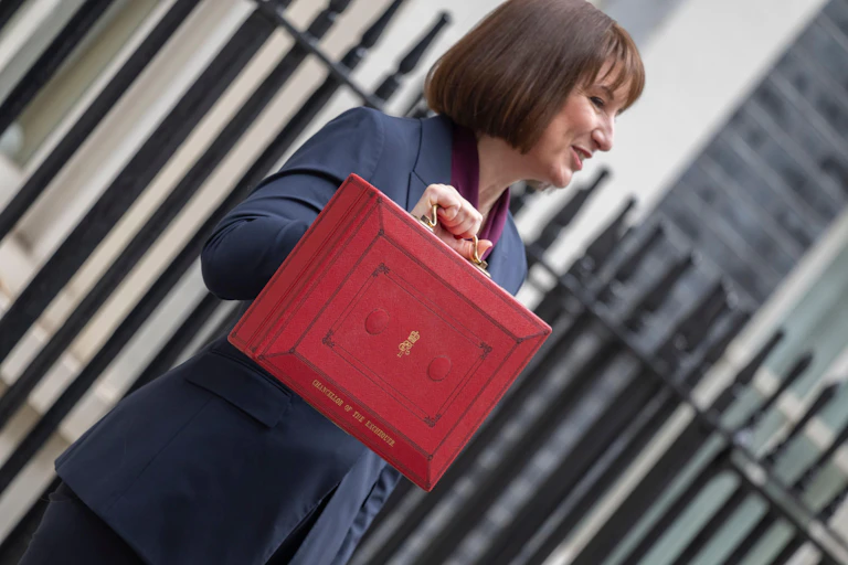 Chancellor Rachel Reeves holding a red briefcase