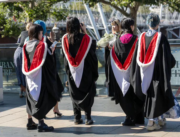 A group of graduates in their gowns.