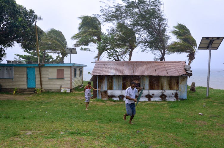 People running away from boarded up homes