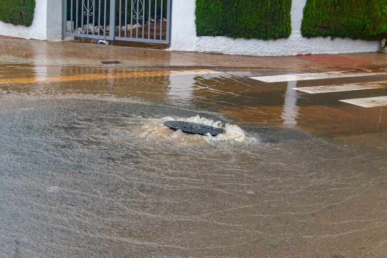 manhole floodwaters