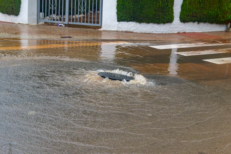 manhole floodwaters