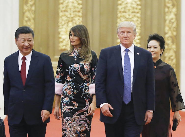 Xi Jingping y su esposa Peng Liyuan con Donald y Melania Trump.
