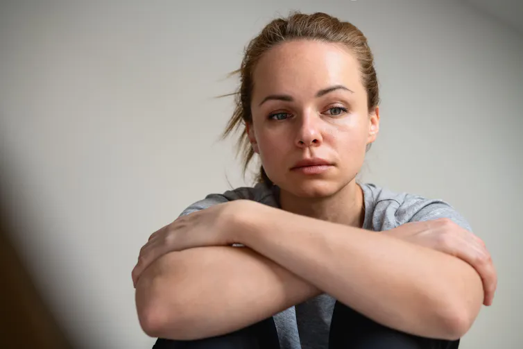 Depressed looking young woman.