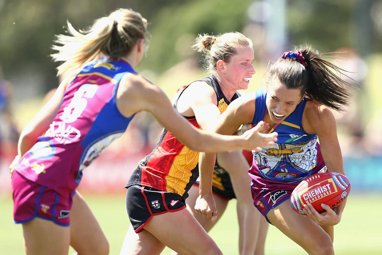AFLW players compete for the ball during a 2024 clash.