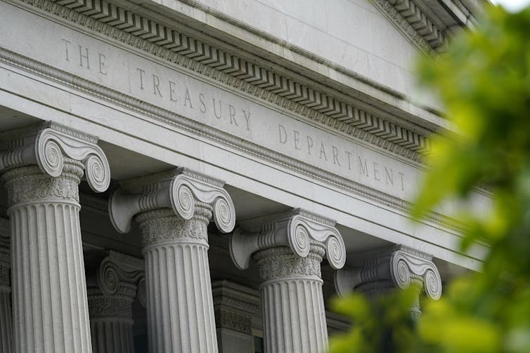 Signage on the front of the US Treasury Building in Washington DC