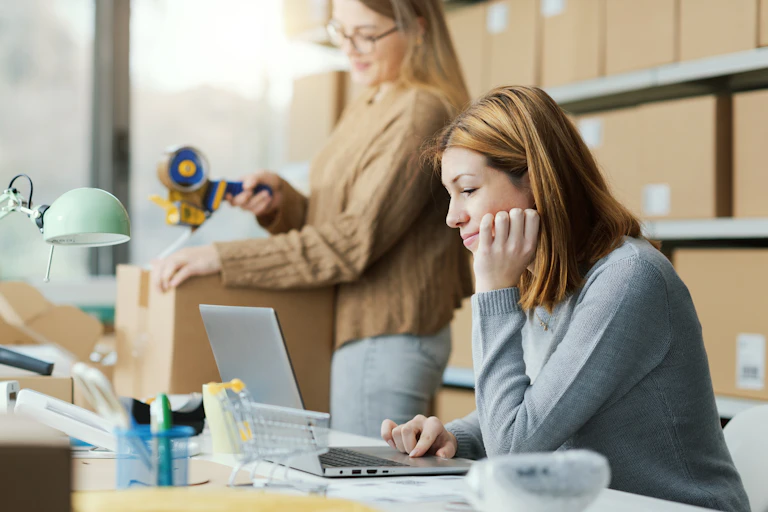 two women working for a small ecommerce business
