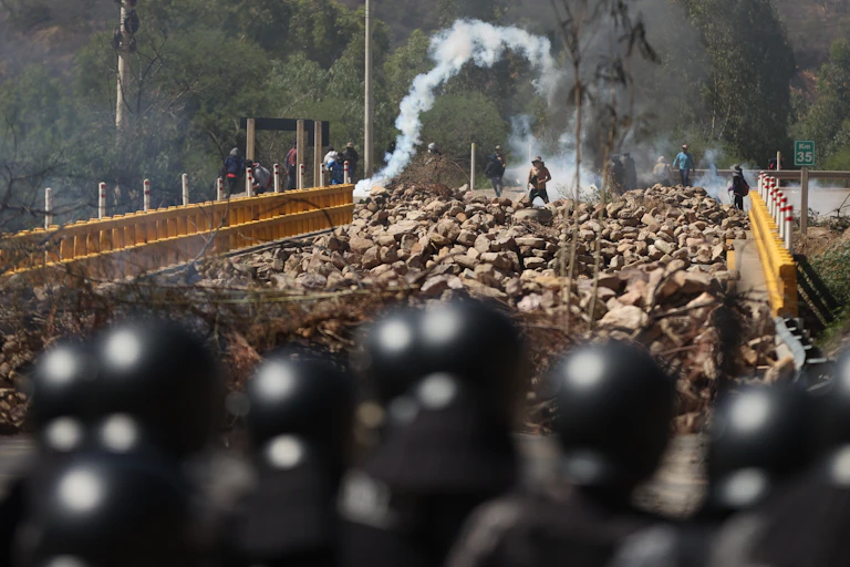 A roadblock separating supporters of Morales and security forces.