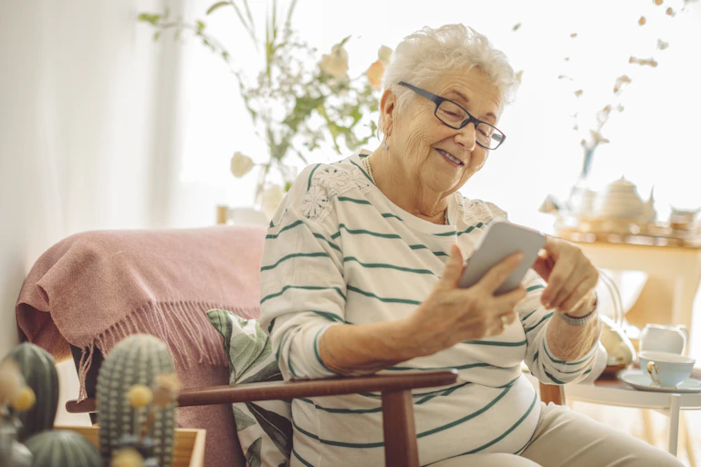 A senior woman on her phone