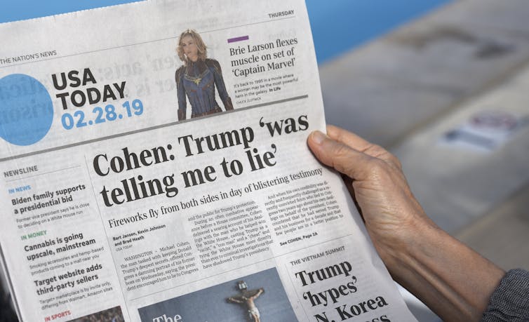 A USA Today edition from 2019 with a headline, 'Cohen: Trump 'was telling me to lie''