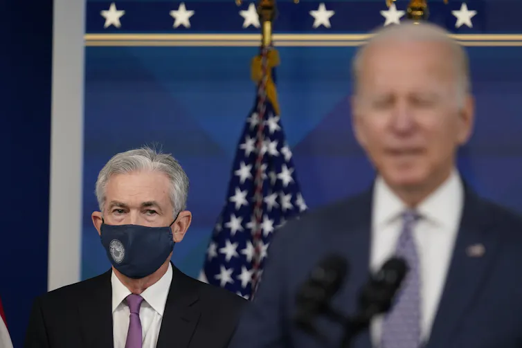 US Federal Reserve chair Jerome Powell and US President Joe Biden speak together at a press conference