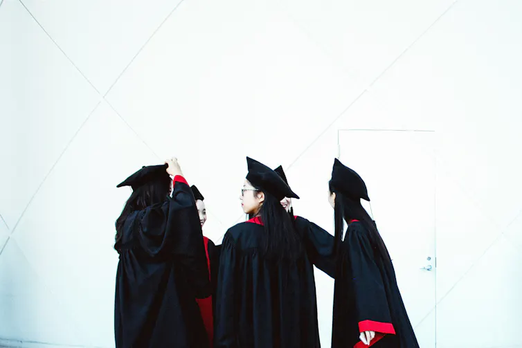 Women at a graduation.