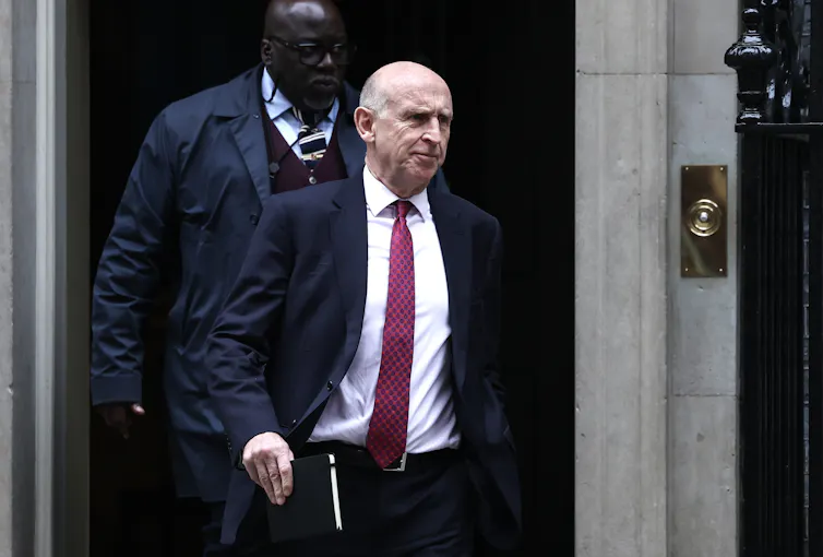 John Healy walking out of Number 10 Downing Street