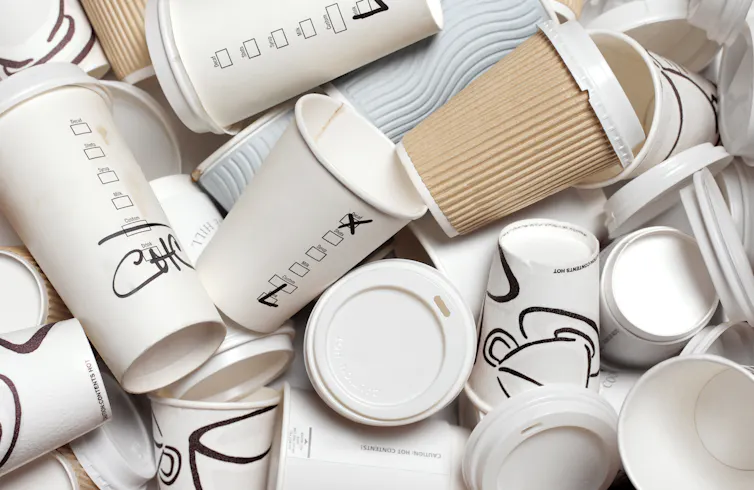 A stack of unrecyclable take away coffee cups