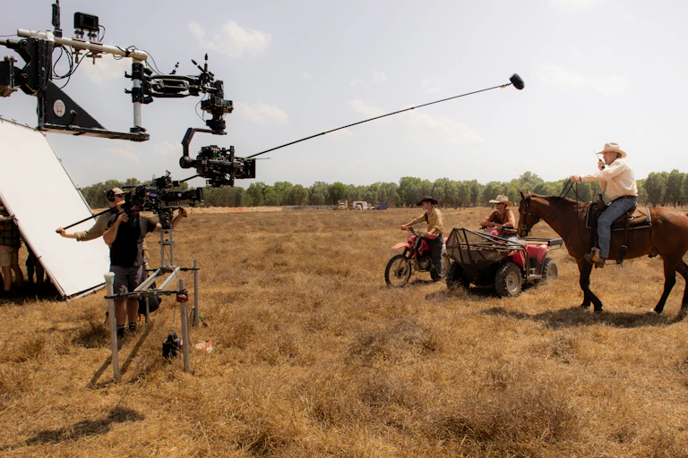 Film cameras, motorbikes and a horse.