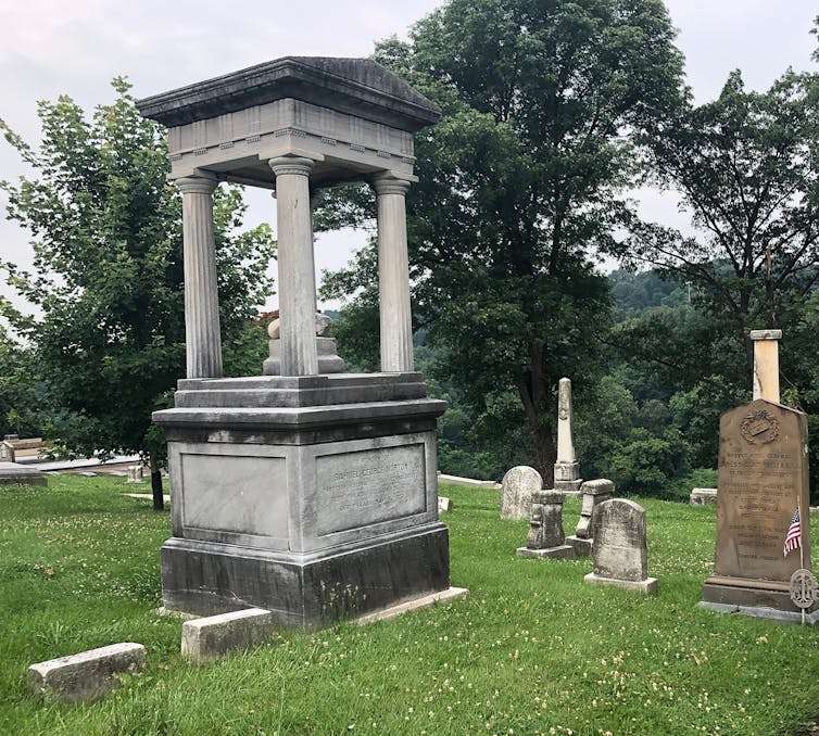 stone monument in a graveyard