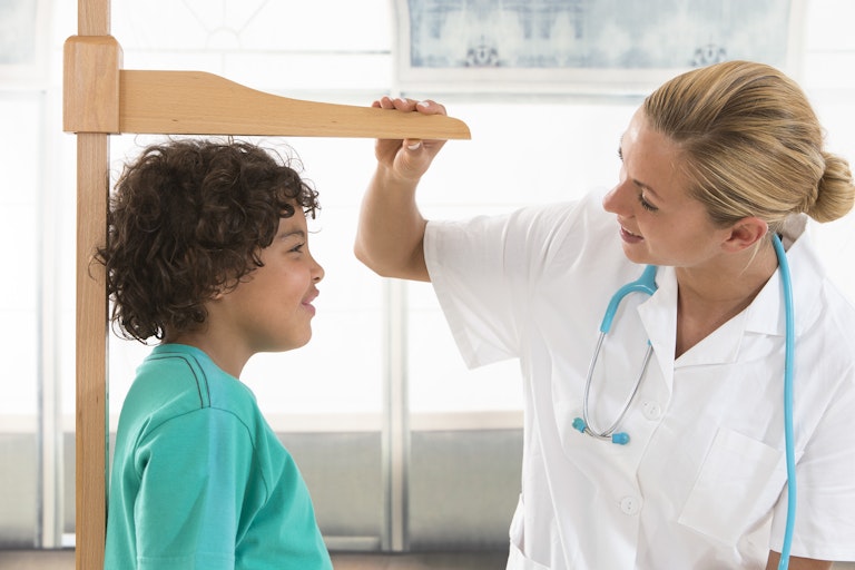 Clinician measures child's height