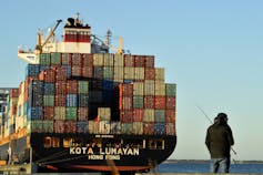 Large freighter ship loaded with shipping containers