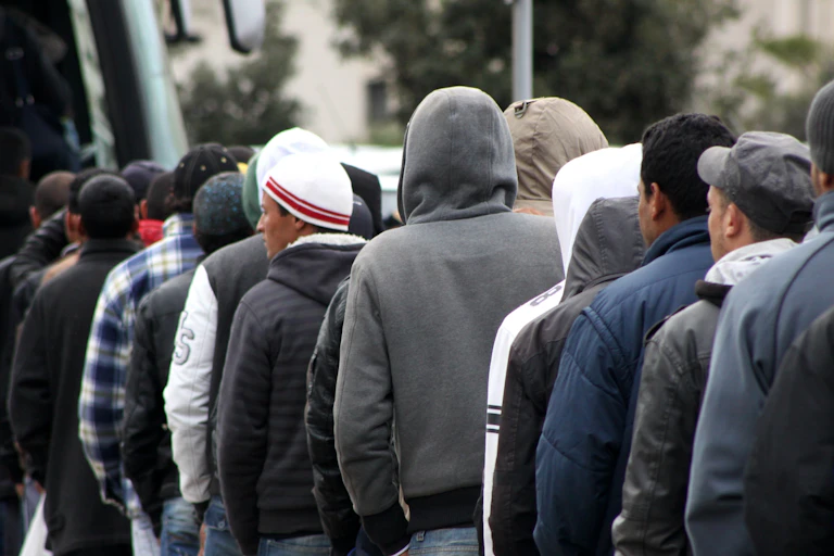 A queue of migrants.