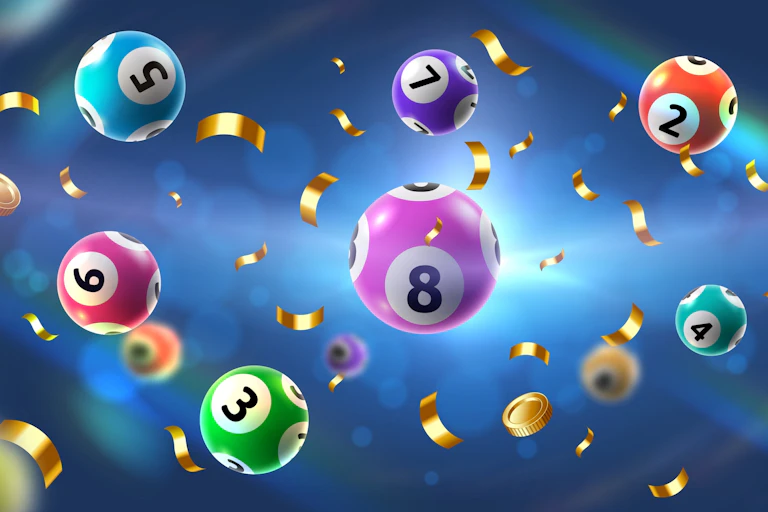 bright coloured numbered bingo balls on blue background
