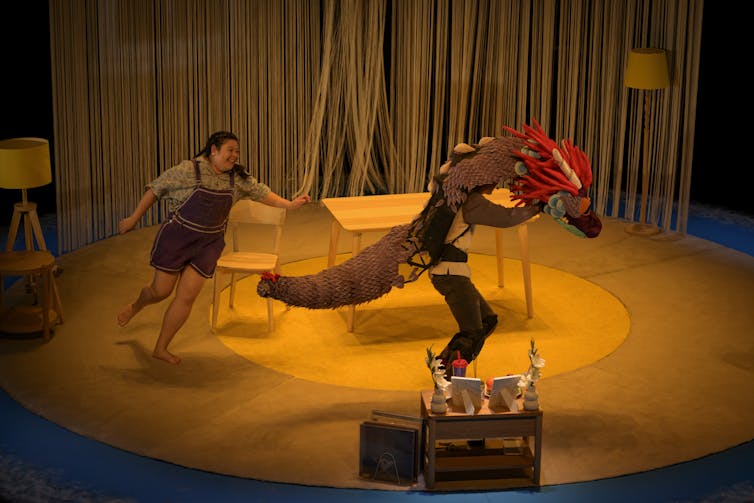 A girl chases a dragon.