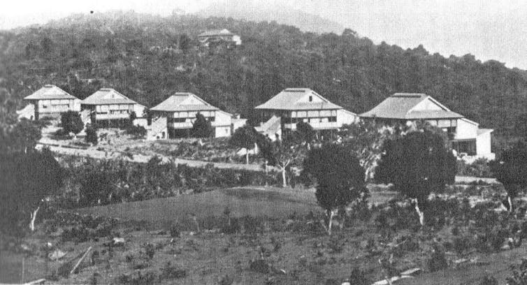 A black and white image of the first completed bungalows of Hill Station.