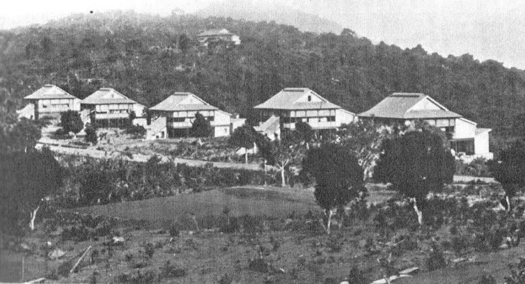 A black and white image of the first completed bungalows of Hill Station.