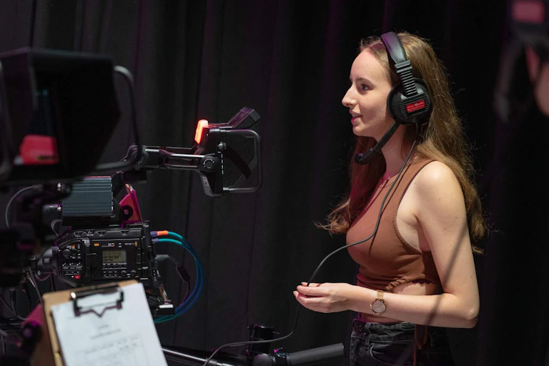 Woman operating camera