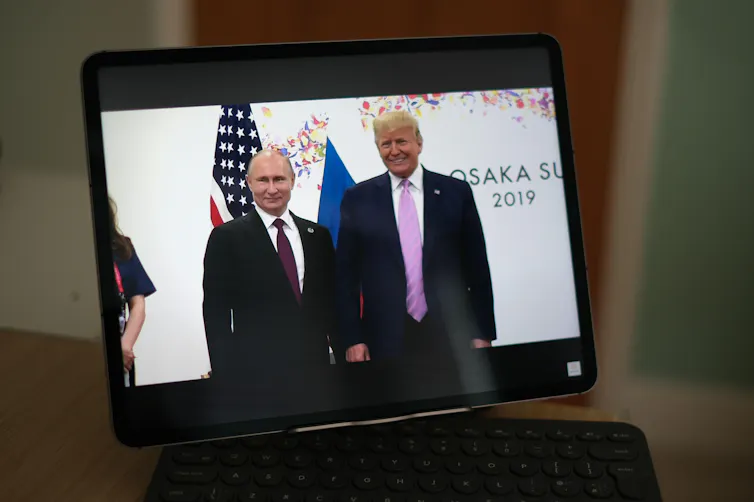 Donald Trump and Vladimir Putin meet at the G20 Summit June 2019.