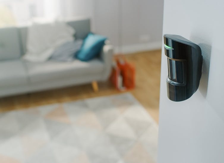 Sensor mounted on a living room wall